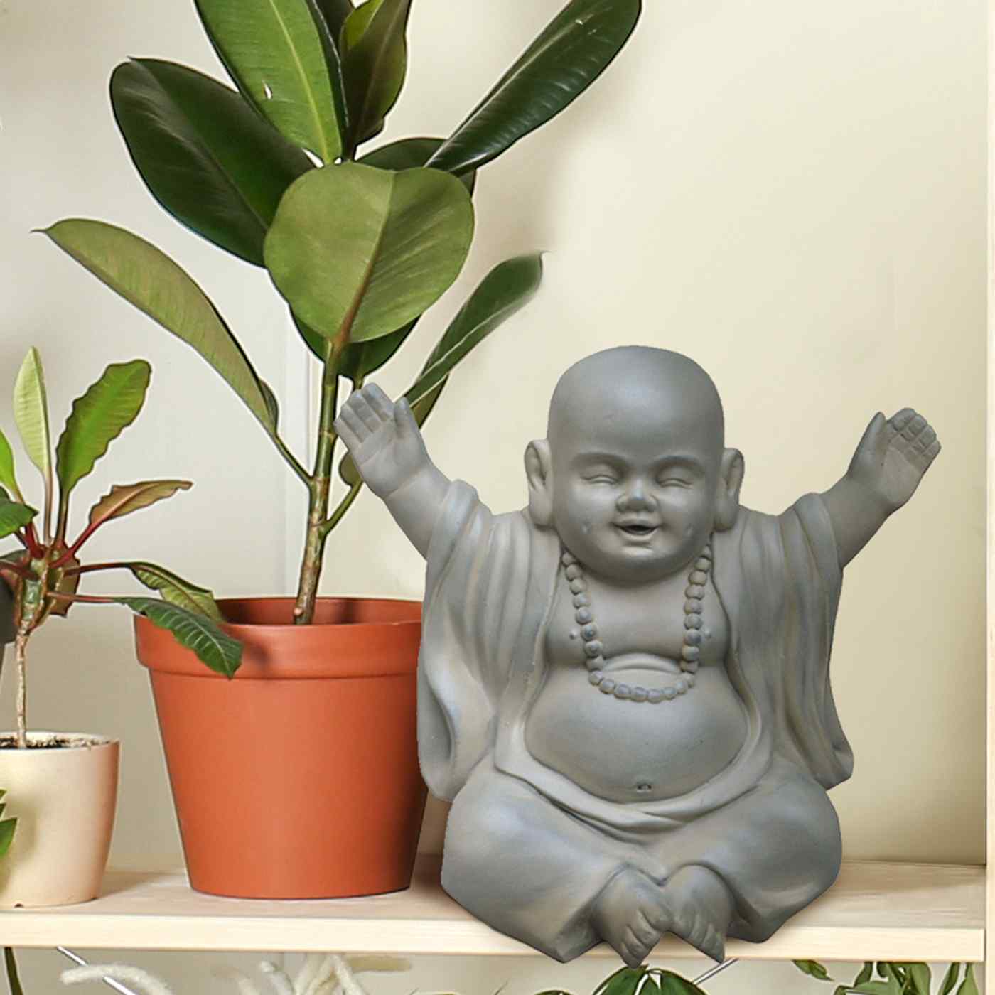 IDEALIST Lite Laughing Baby Monk Moss Washed Indoor and Outdoor Statue L35.5 W25.5 H31.5 cm