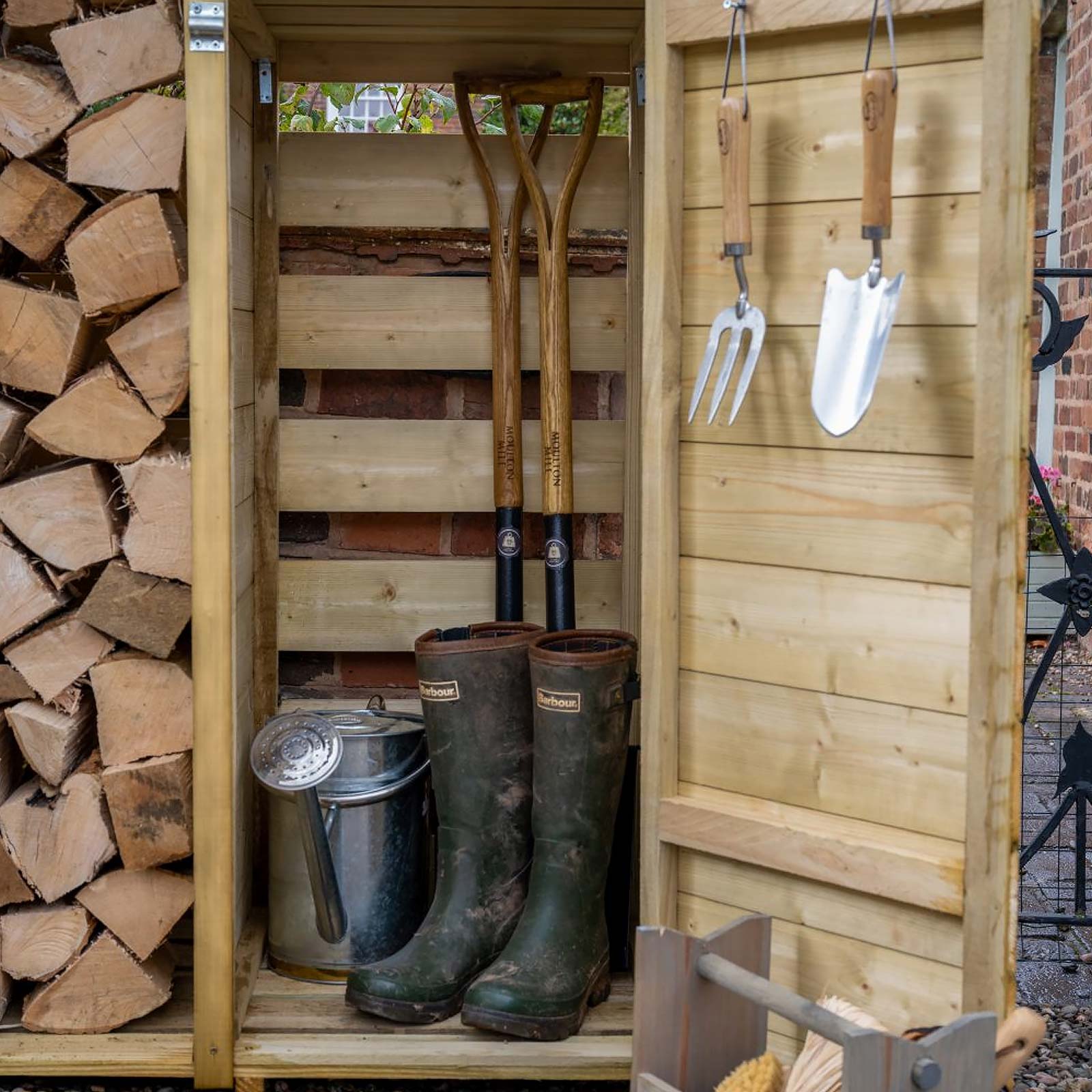 Outdoor Wooden Log and Tool Store by Forest Garden