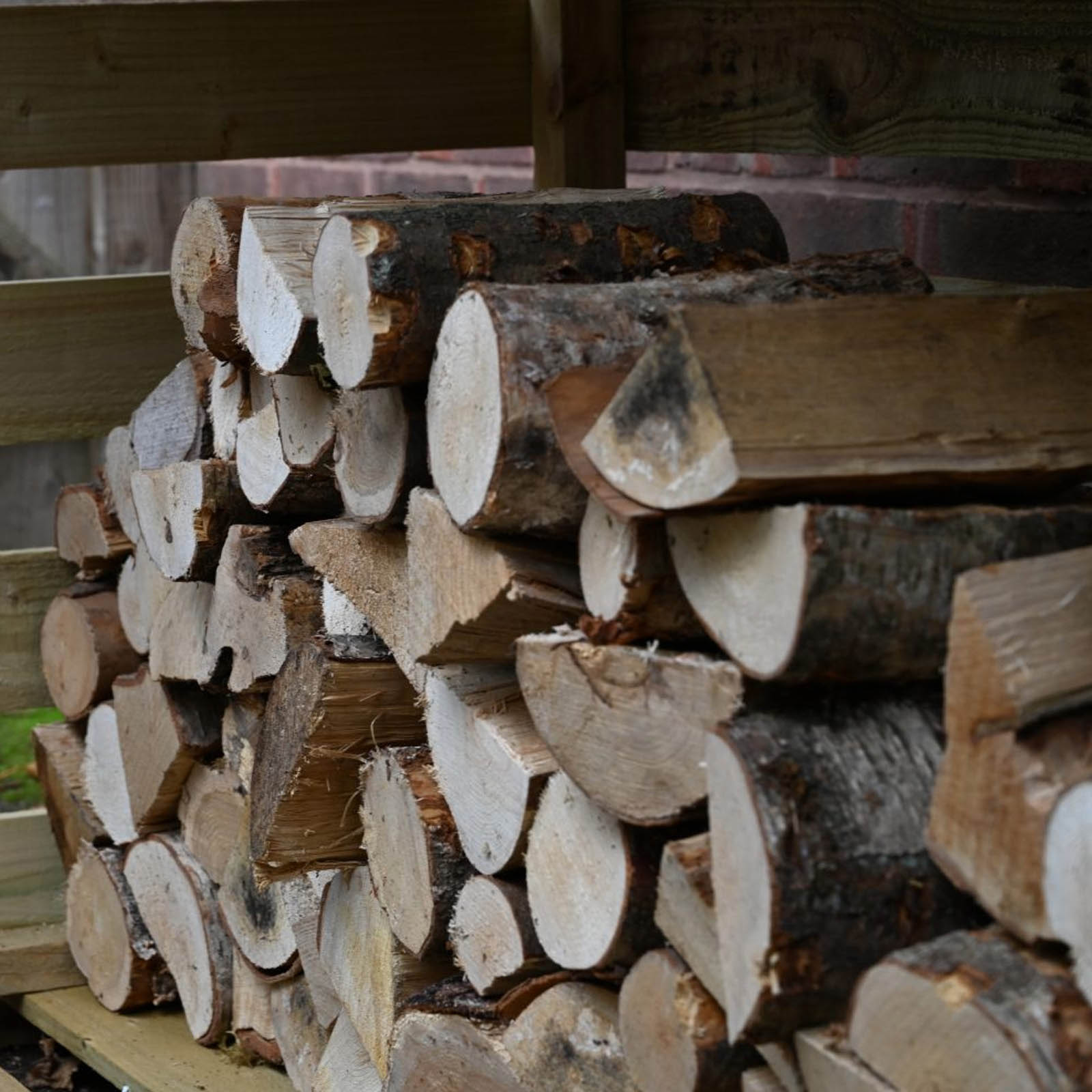 Outdoor Wooden Pent Log Store by Forest Garden
