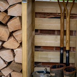 Outdoor Wooden Log and Tool Store by Forest Garden